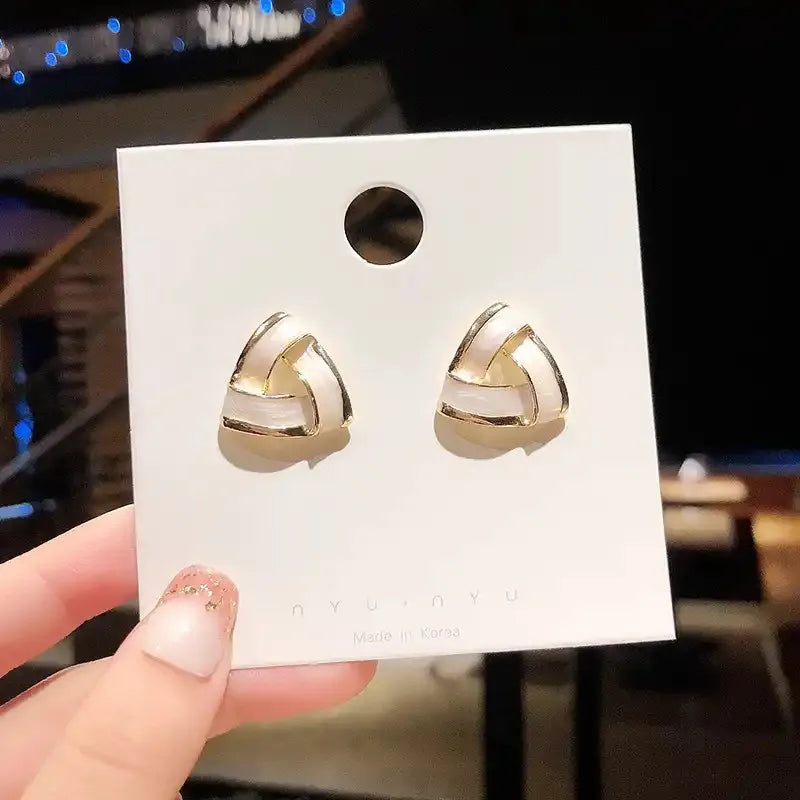 Elegant Pearl-White Enamel Knot Earrings with Gold Accents